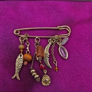 979. Gold-Tone Bohemian Charm Safety Pin Brooch